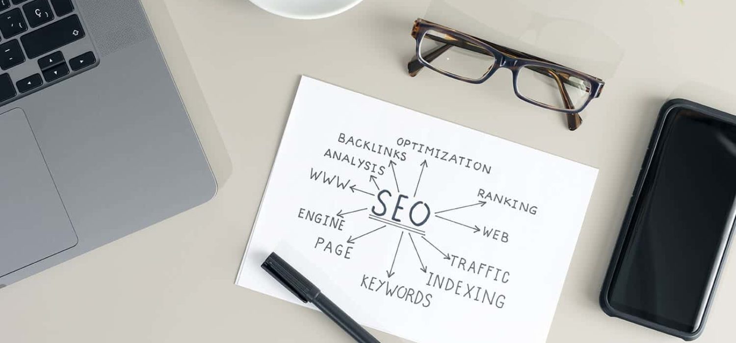 working-desk-with-paper-sheet-with-seo-planning